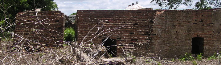 The steam engine base raises the steam engine to allow room for the flywheel.